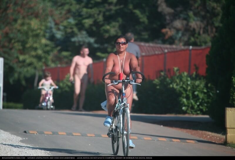 Naturists Road Biking pics - She appeared completely naked