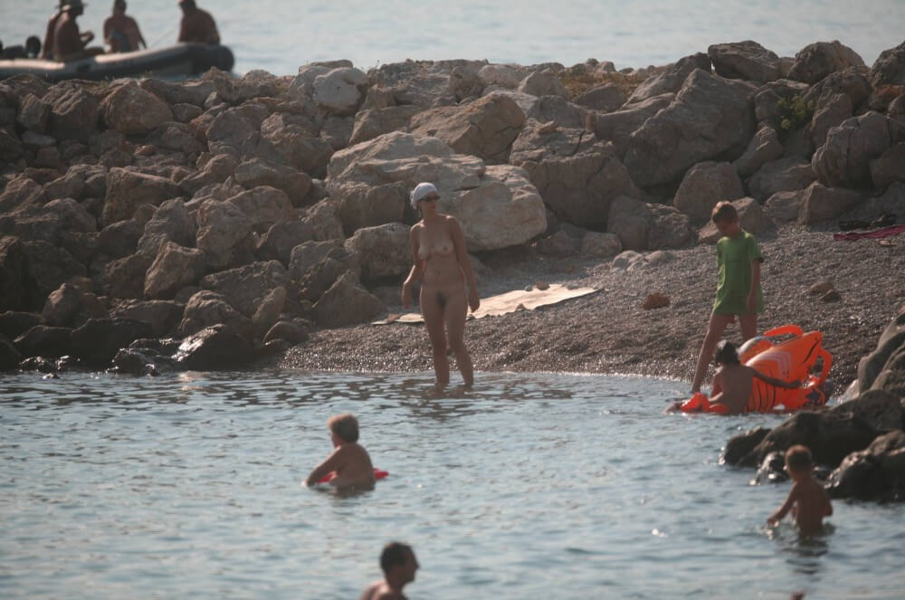 FKK cove pyramid in waters - Nudity is a natural way to express respect for nature and oneself