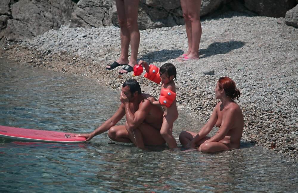 Beach Nudist Family Shore Camp pics - A person without clothes is closer to the wild