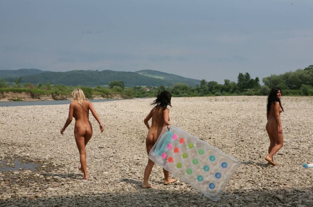 Naturist Park Floating On River photos - Naturism encourages sincerity and honesty regarding the body