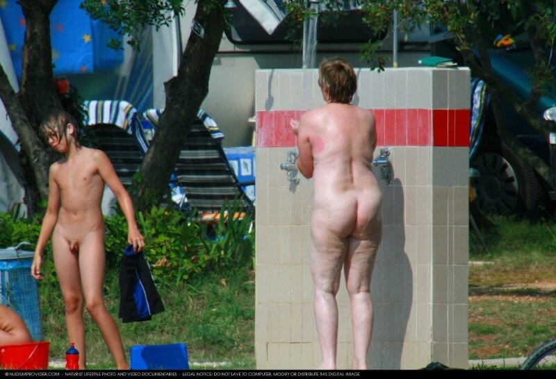Covered in Towel Nudists-Boardwalk Biking - The practice of nudism helps to overcome stereotypes and insecurities
