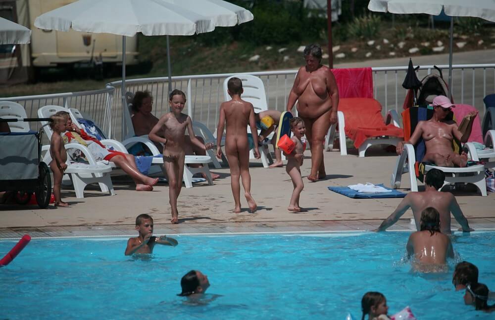 Naturist Afternoon Pool Games pics - Nudism helps to overcome shyness and insecurities