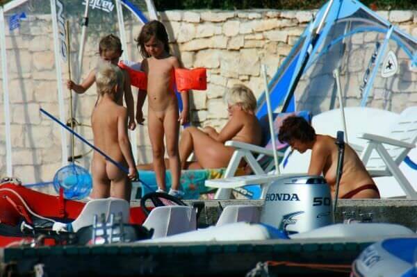 By the boat photos - A love of the sun and fresh air are important values for those who practice naturism and nudism