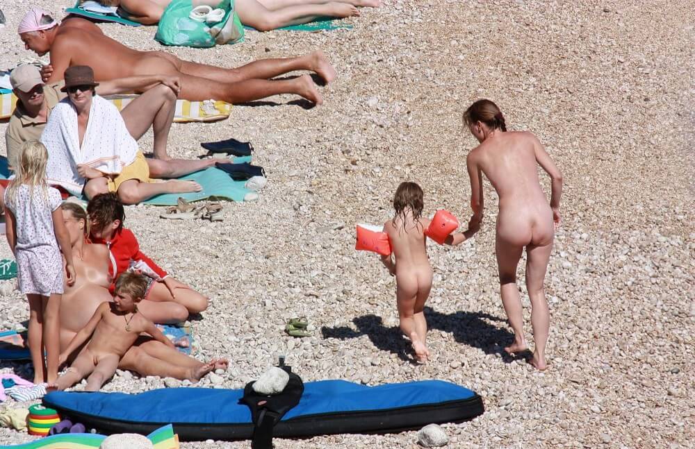 Orange Floaty Safety First Naturist pics - Nudity fosters trust and honesty
